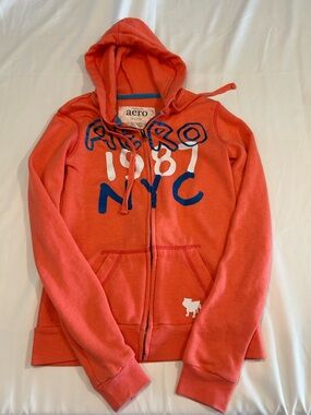 Aero Coral Zip-Up Hoodie with Blue Trim